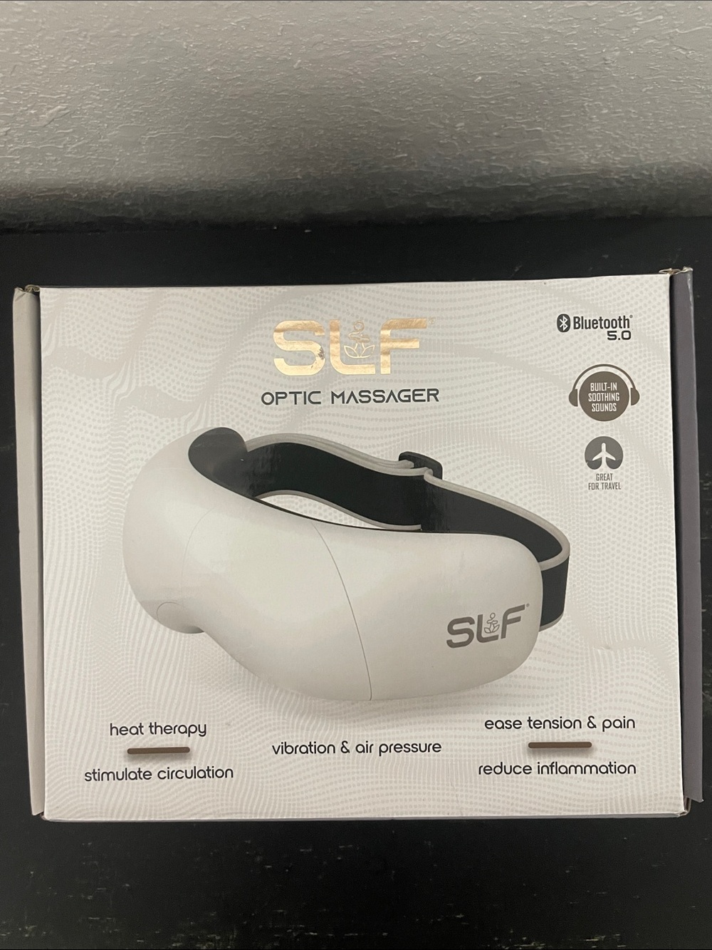LF Eye Massager in White & Black with USB Cable
